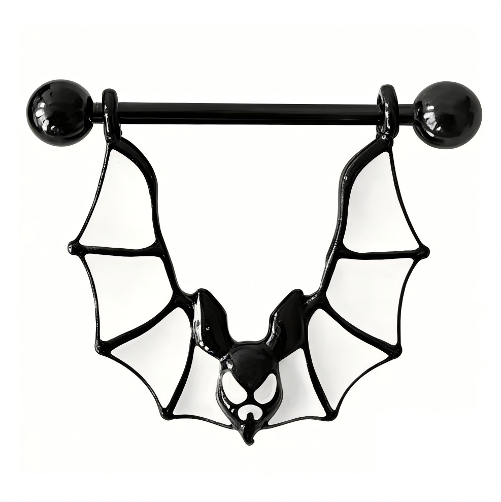 Close-up of a black bat wing nipple piercing ring with white enamel wings.