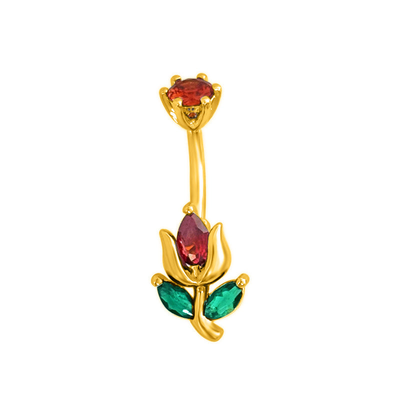 Gold tone navel body jewelry with a floral design showcasing a vibrant red crystal center and two green gemstone leaves
