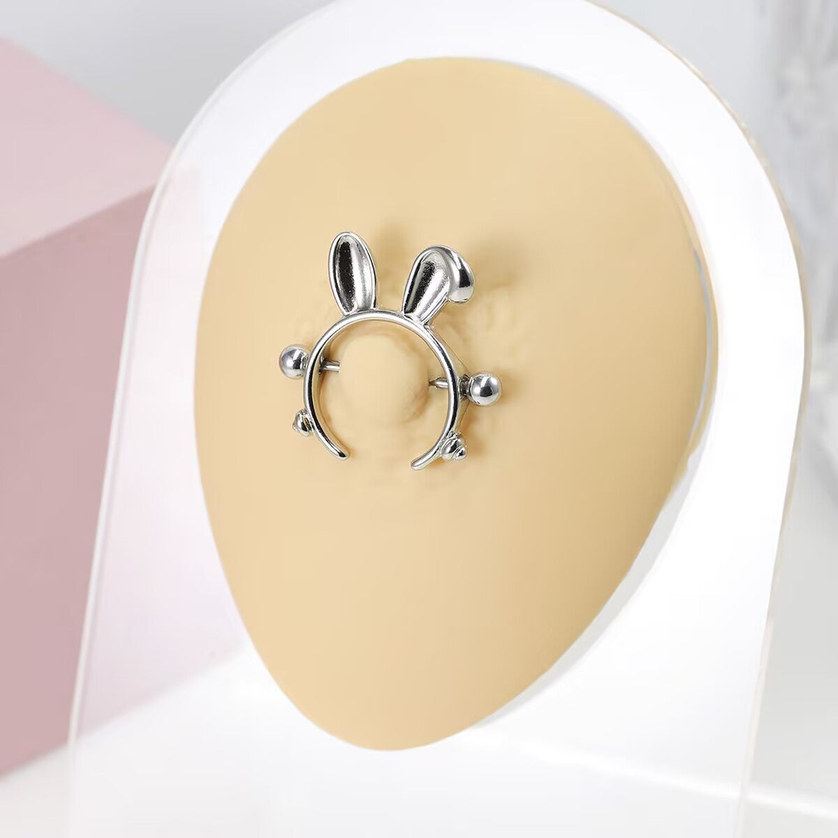 Realistic silicone mold showcasing the bunny ear nipple shield fit
