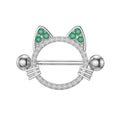 Front view of a silver cat-shaped nipple shield with green ear accents and clear crystals.