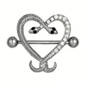 Clear crystal gothic snake heart nipple ring on white background.