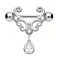 Front view of a polished filigree nipple shield featuring sparkling round and pear-shaped accents