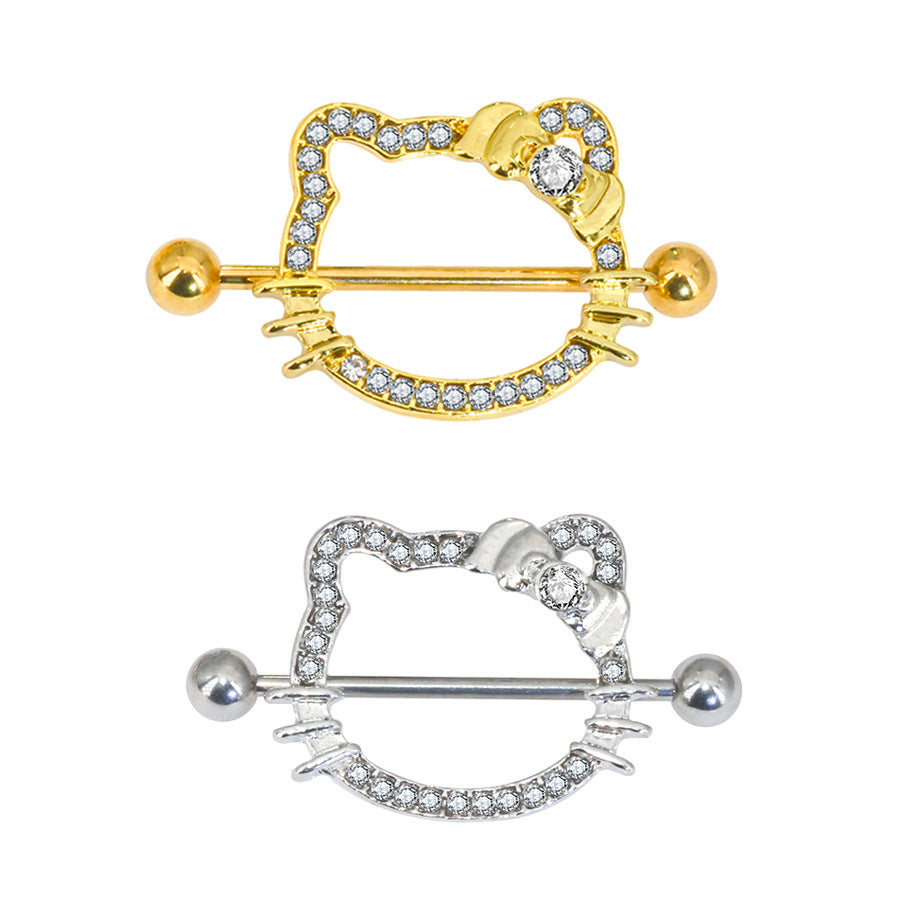 Comparison of gold and silver cat-shaped nipple shields side-by-side on a white background.