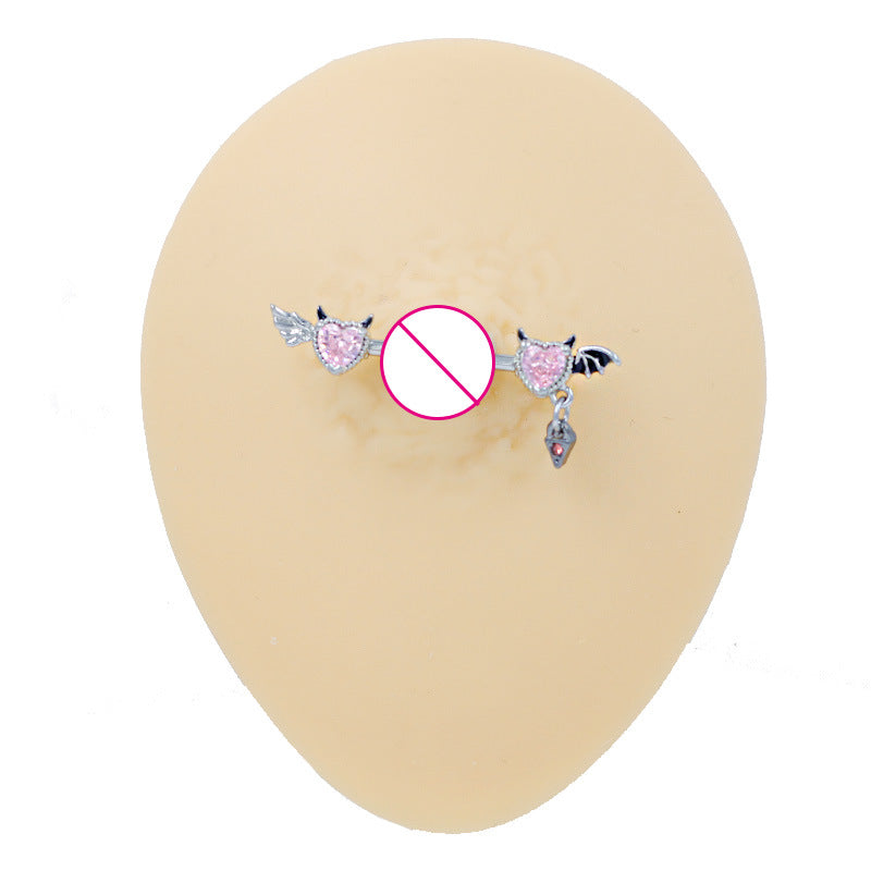 Professional display of a pink heart nipple barbell on a silicone skin model for size reference.