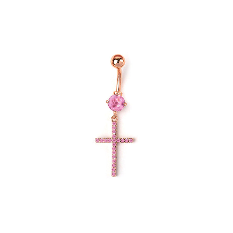 A rose gold tone body piercing navel ring showcasing a bright pink main gemstone and a delicate dangling rhinestone cross