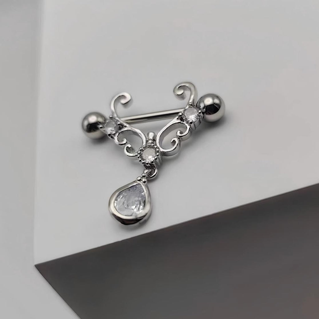 Close-up of a high-end nipple shield on a minimalist grey and white background for lifestyle display.