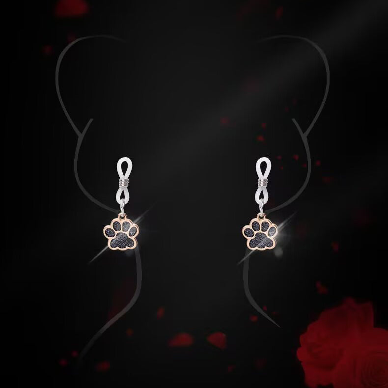 Silhouette illustration showing how to wear the adjustable paw print jewelry on the body.
