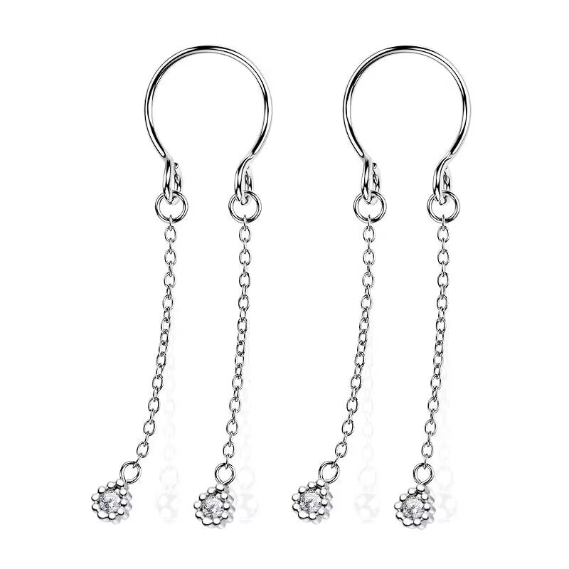 A pair of silver-colored non-piercing fake nipple rings featuring U-shaped adjustable cuffs and dual dangling chains adorned with shimmering crystal droplets at the ends, isolated on a white background.