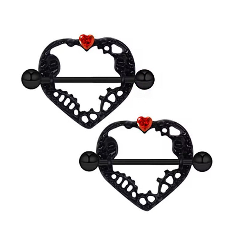 A pair of matching black skeletal heart nipple barbells with red gems.