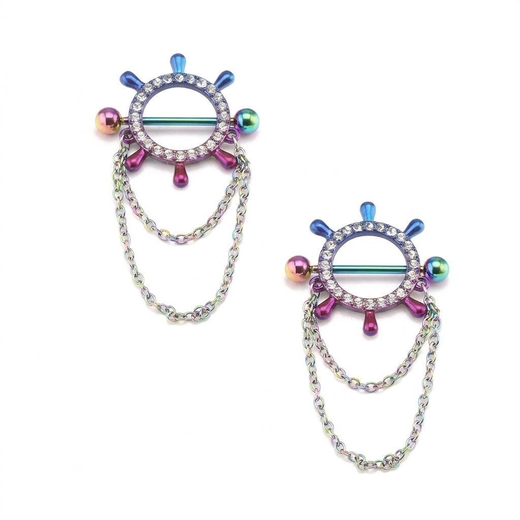 A matching pair of iridescent rainbow nautical helm nipple shields encrusted with sparkling crystals and double layered fringe chains.