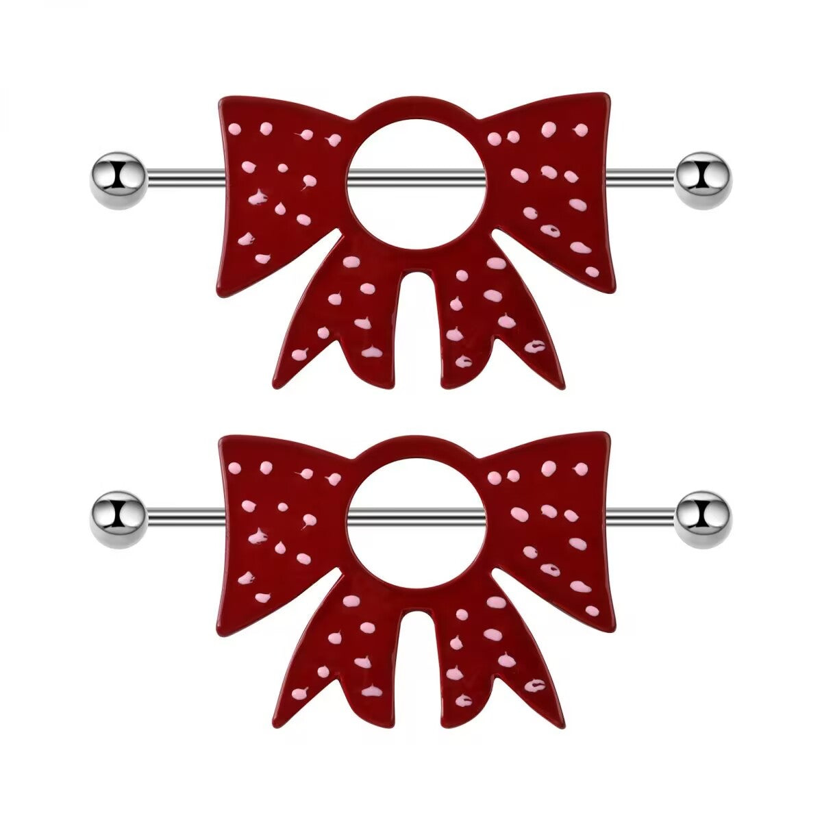 A matching pair of red and pink polka dot bow nipple barbells