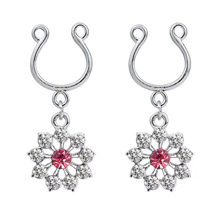 A matching pair of adjustable non-piercing nipple rings featuring sparkling pink flower dangles.