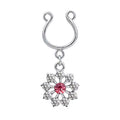 Front view of a silver-toned non-piercing nipple ring with a pink crystal flower dangle on a white background.