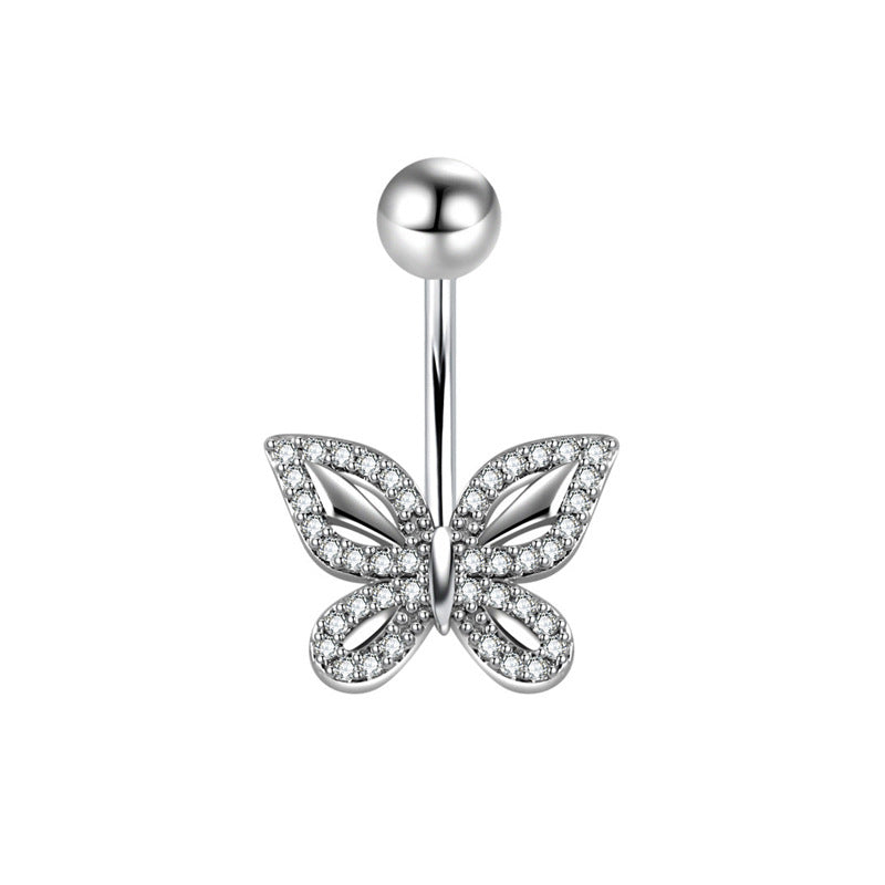 A sparkling silver-toned butterfly navel piercing featuring intricate crystal pavé wings and a smooth metallic curved barbell with a top ball closure