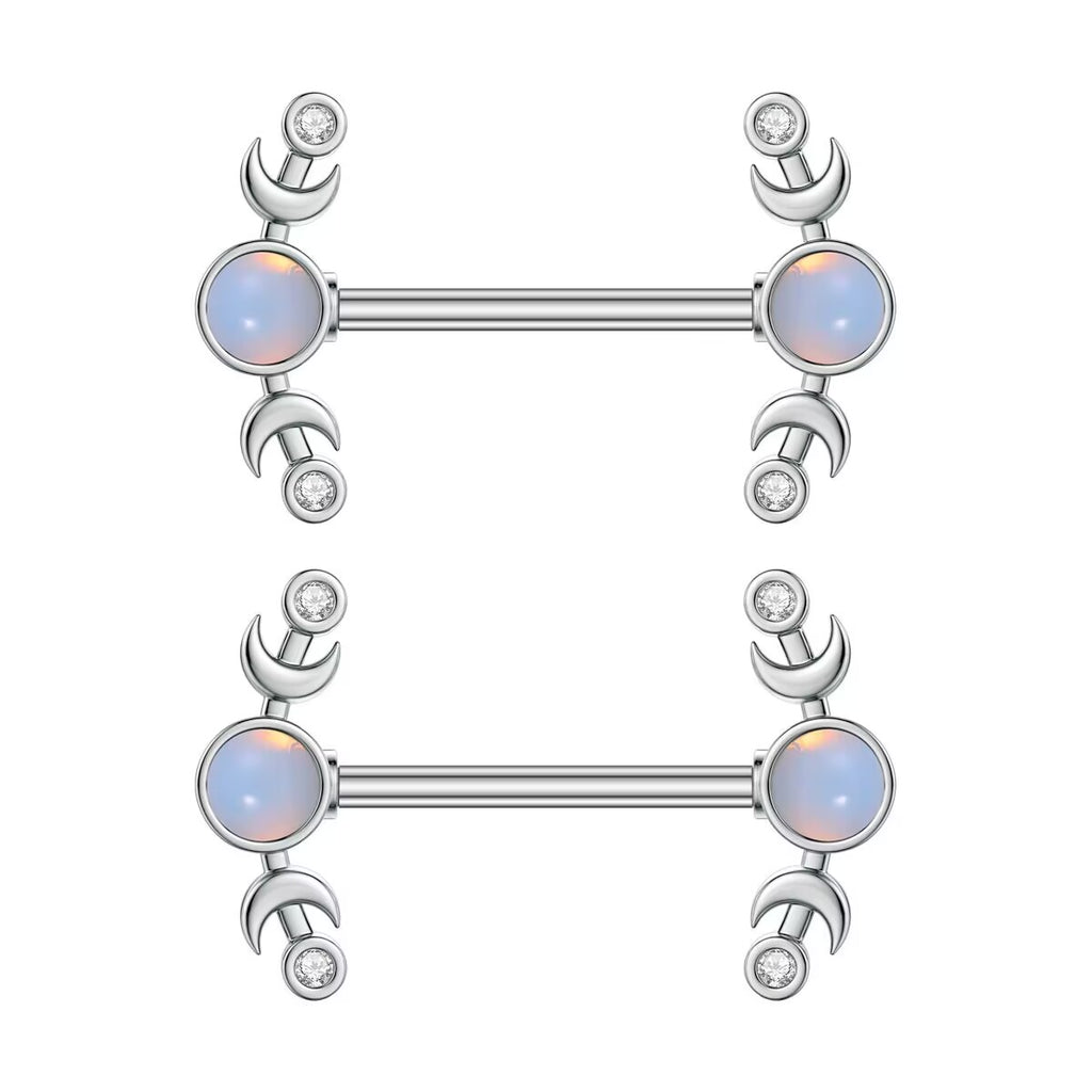 A matching pair of symmetrical crescent moon nipple rings featuring central opals and sparkling crystal details on a pure white background.